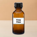 Ember & Co Cozy Time diffuser oil in amber glass bottle with warm seasonal scent