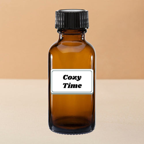 Ember & Co Cozy Time diffuser oil in amber glass bottle with warm seasonal scent