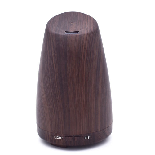 Ember & Co aromatherapy oil diffuser in dark woodgrain finish with light and mist controls