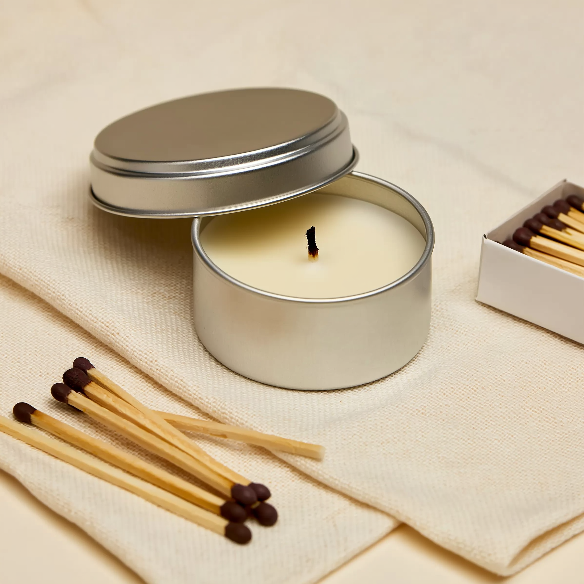 Ember & Co Travel Candle with Matches — soy candle in silver tin with loose wooden matches